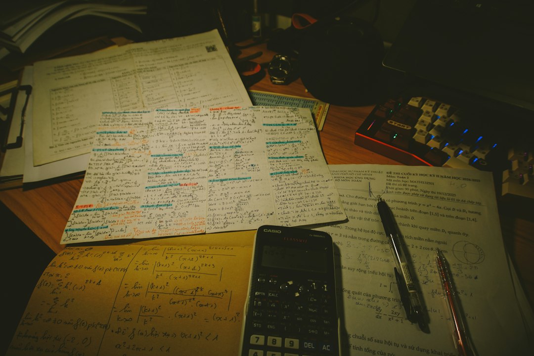Papers, forms, and a pen on a desk